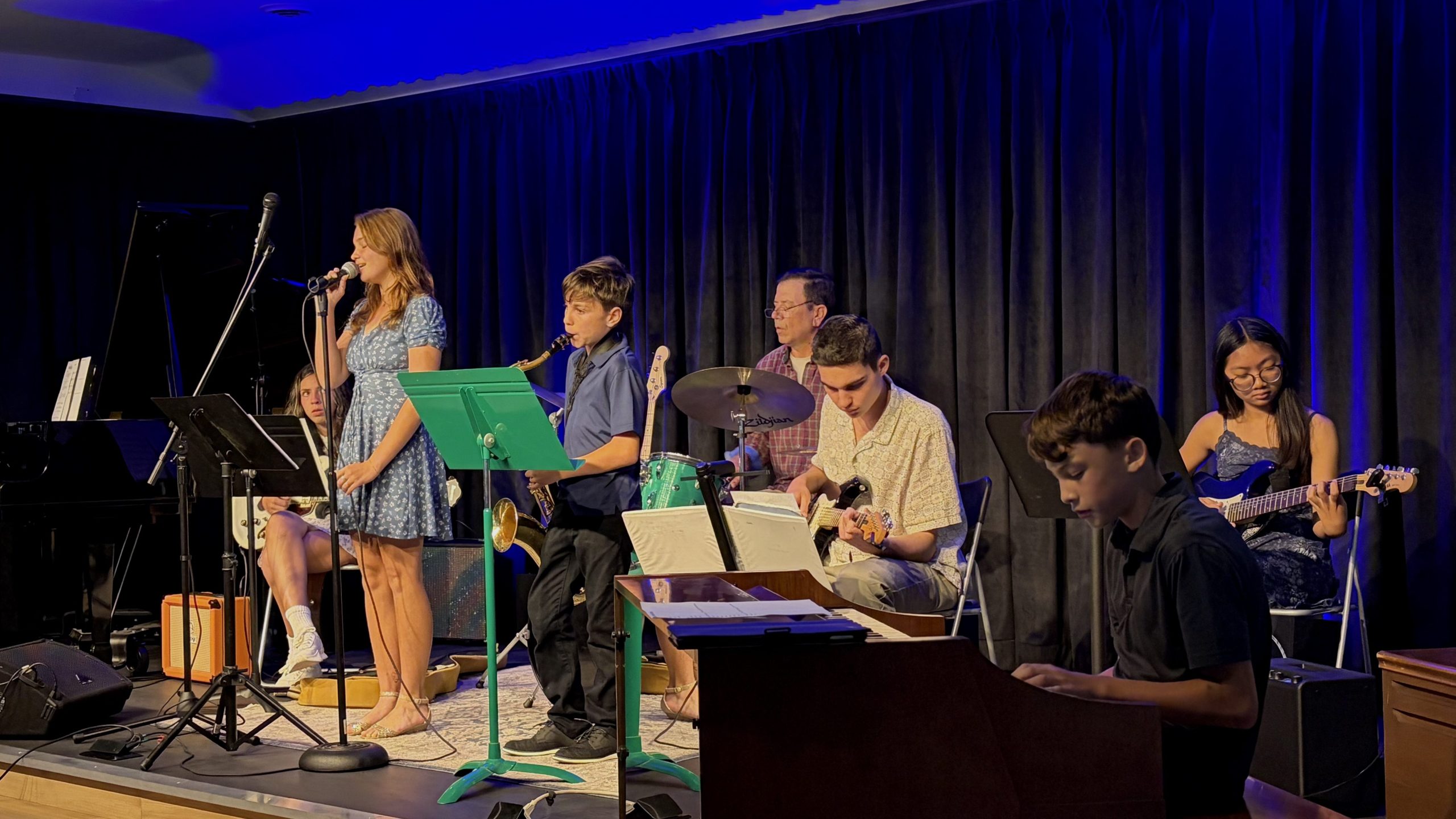 Teens playing in a group lesson, Jazz ensemble, at paper moon event hall